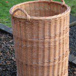 round linen basket on castors